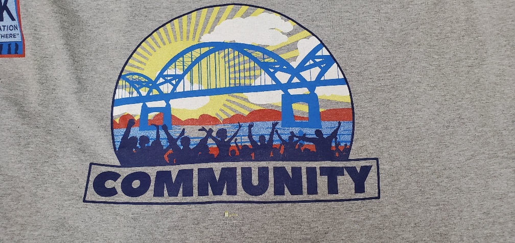 Custom community event t-shirt with bridge graphic and "Community" text.