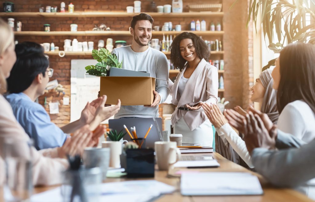 Custom T-shirts displayed as promotional items at a store event.